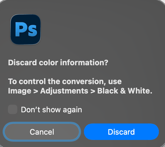 Photoshop asking to discard color information, suggesting the Black and White adjustment