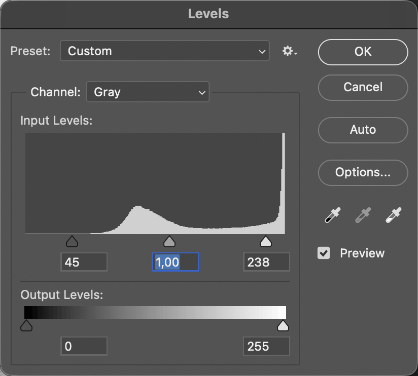 The Levels dialog with the input black point at 45 and the white point at 238