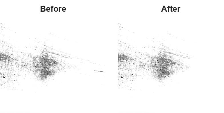 A stray ink dash before and after painting over it with white
